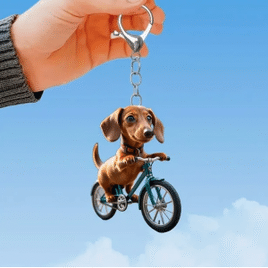 Chaveiro de Dachshund em Bicicleta